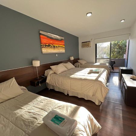 Costalago Suites- By Hvh Вилья-Карлос-Пас Экстерьер фото