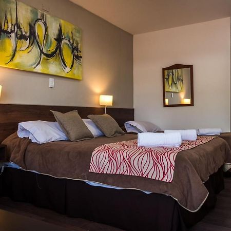 Costalago Suites- By Hvh Вилья-Карлос-Пас Экстерьер фото