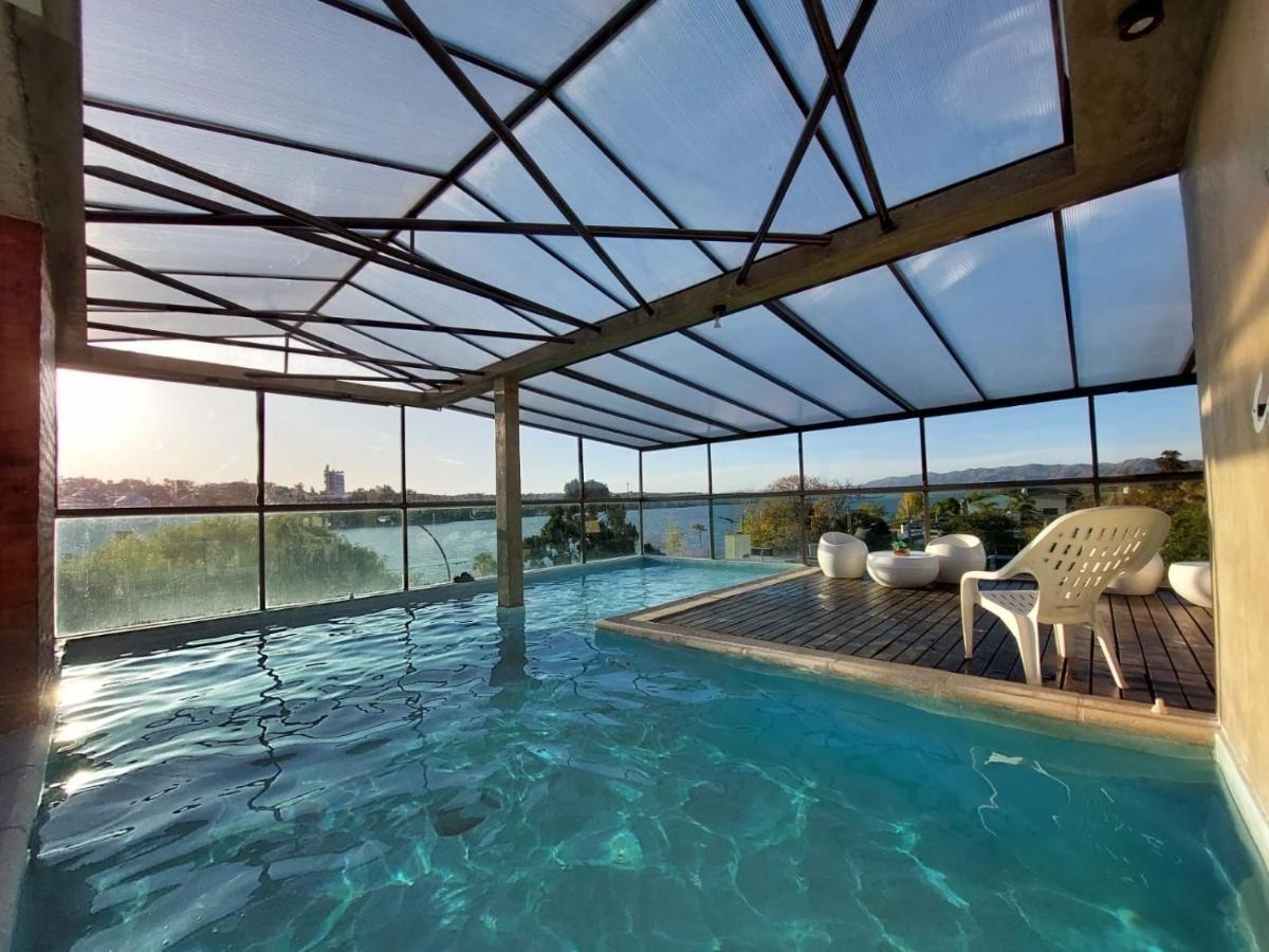 Costalago Suites- By Hvh Вилья-Карлос-Пас Экстерьер фото